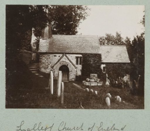 A small church with an adjacent cemetery.