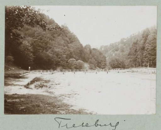 River view with a wooded mountain landscape in the background