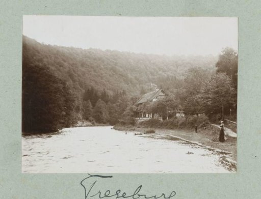 River view against the background of a wooded mountain landscape