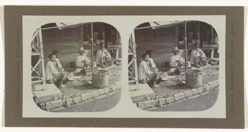 Tailors with sewing machines in Bandung.