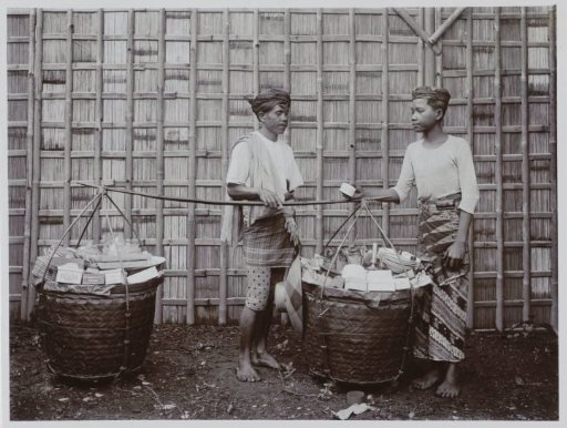 Two Street Vendors with Woven Rattan Baskets Full of Various Items