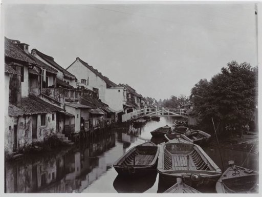 View Along a Waterway on Java with Houses on Both Sides