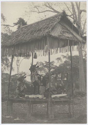 A Hindu cremation ritual where bones and remains are placed in ox-like statues before being burned.