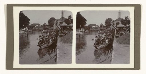 Overcrowded sailing boat at the Willemskade in Surabaya