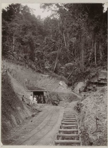Local workers and a European during the construction of a tunnel near Sawahlunto