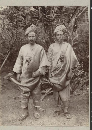Portrait of two unknown Malay men in local dress