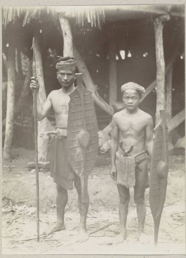Portrait of two unknown Indonesian warriors or hunters