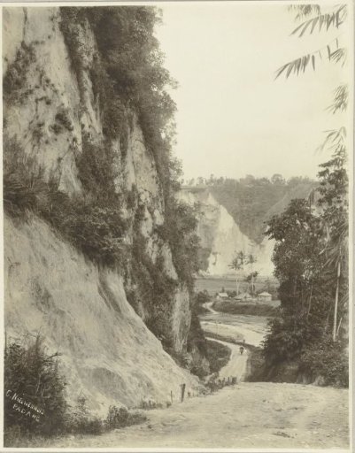 View through a valley, seen from an inland road, probably in the vicinity of Padang