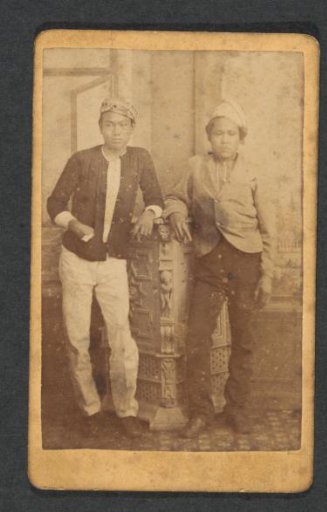 Portrait of two boys, probably in the Dutch East Indies