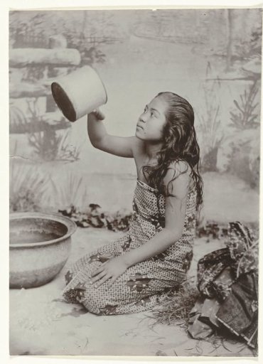 Studio Portrait of a Young Javanese Woman Washing