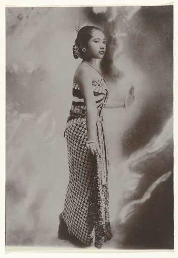 Studio Portrait of a Javanese Dancer with Background Light Effects