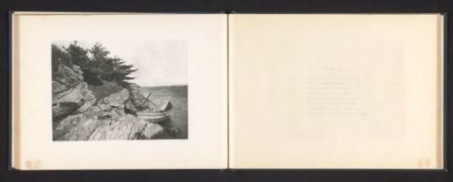View of an island and a bay with a rowboat near Maine