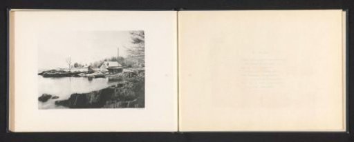 View of a coast with a house and a boat in Maine