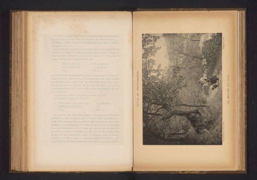 Two unknown young women on a path by a forest