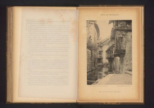 View of a street by water in Annecy