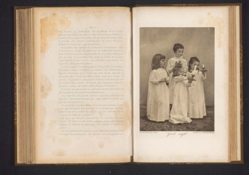 Four children with candles