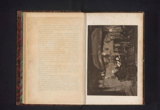 An Unknown Older Man Behind a Desk in a Dark Room