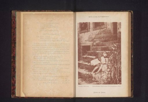 Unknown Boy Lying on a Staircase Barefoot