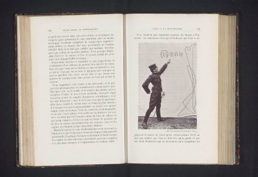 Man in Uniform Pointing to a Printed Cloth