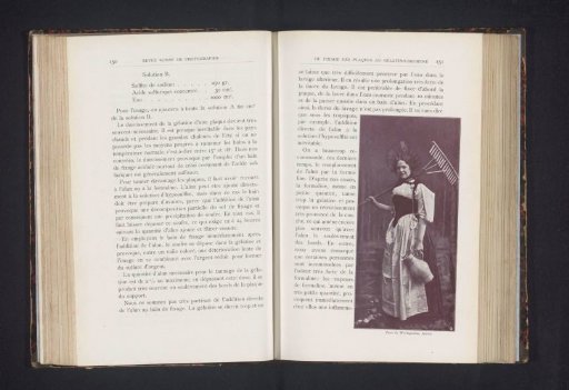 Portrait of an unknown woman with a rake and a jug