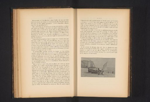 Men with a sailboat on the beach
