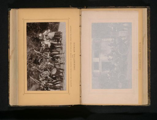 View of a group of unknown persons, one of whom with a drum, apparently re-enacting a battle or fight