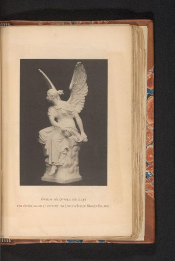 View of a statue of an angel holding a wreath