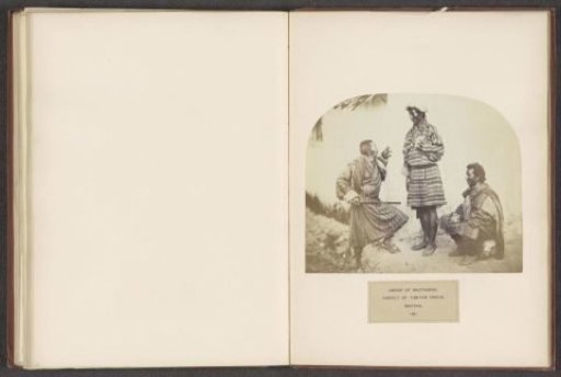 Three men from Bhutan on the street