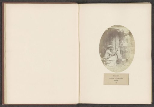 Two unknown men with a rifle from the Malik clan of Bihar in eastern India
