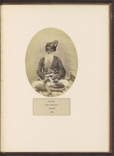 Portrait of an unknown mendicant with a bow from the Akali community of Lahore, Punjab, Pakistan