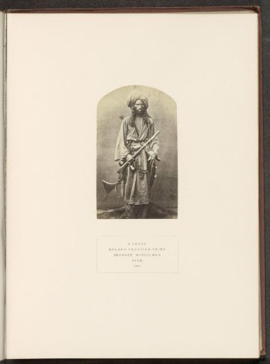 Portrait of an unknown man with a rifle from the Khosa Baloch tribe in Sindh, Pakistan