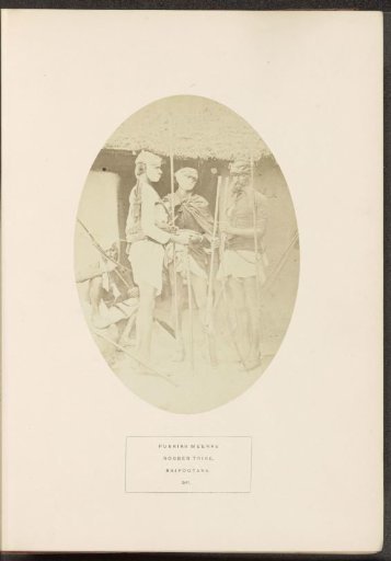Portrait of four unknown men from the Meena tribe with weapons, Rajasthan, India