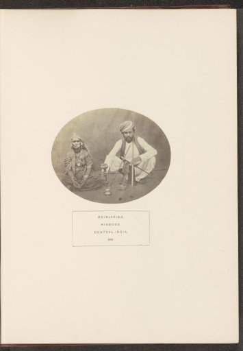 Portrait of two unknown people from the Banjara tribe with a hookah, Madhya Pradesh, India