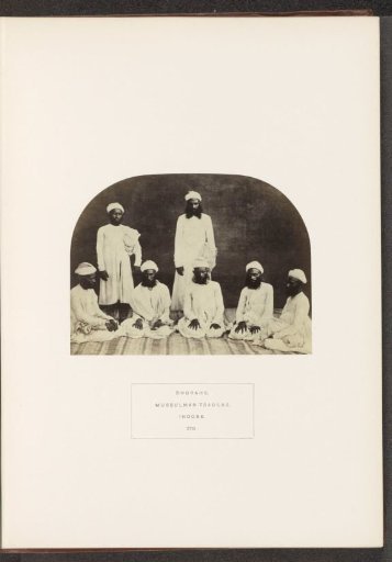 *Portrait of seven unknown traders from the Bohra community of Indore, Madhya Pradesh, India* -> (Already English) -> Portrait of seven unknown traders from the Bohra community of Indore, Madhya Pradesh, India