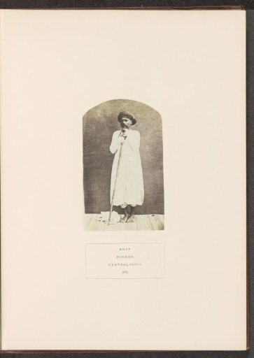 Portrait of an unknown man from the Bhat community with a rod, Madhya Pradesh, India