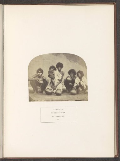 Group portrait of a family from the Yenadi tribe with cooking pots, Chengalpattu, Tamil Nadu, India