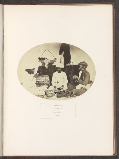 Portrait of three unknown tailors at work in Chennai, Tamil Nadu, India