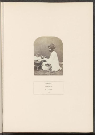 Portrait of an unknown priest from the Smarta Brahmin community seated at a low writing table, Mysore, Karnataka, India