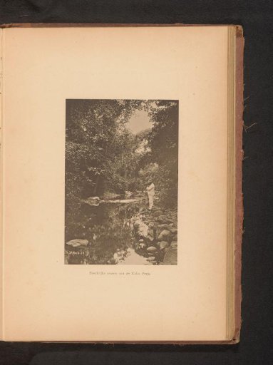 View of an Unknown European Man with a Rifle on the Bank of a River