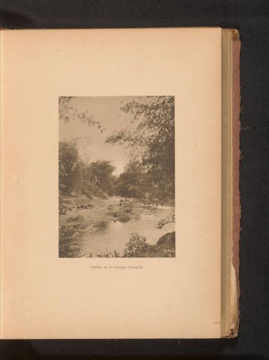 View of the river with unknown persons on the bank