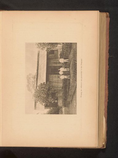 Four unknown European men in front of a dwelling