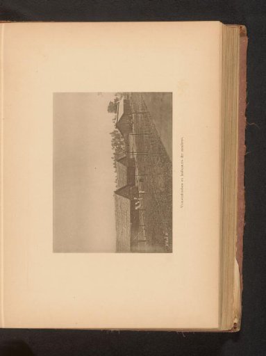 View of warehouses in a field
