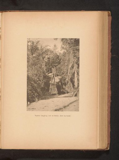 View of a suspension bridge over a river at Kediri