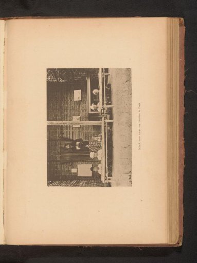 View of unknown children and an unknown man in a school