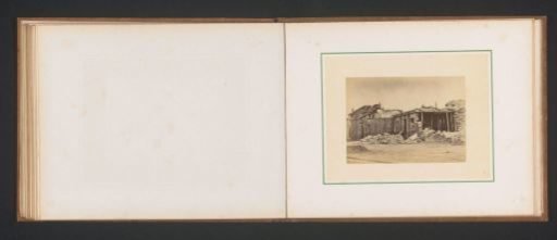 View of the Porte Saint-Cloud in Paris after the fire by the Paris Commune