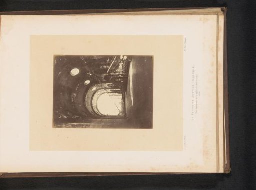 View of a corridor in the Palace of Justice in Paris after the fire by the Paris Commune