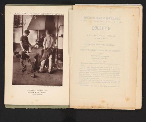 Two men at work in a smithy