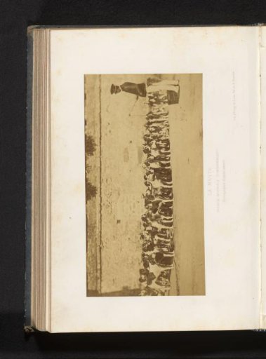Unknown man with a pack of dogs at the imperial kennel