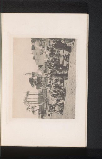 View of a group of unknown persons with dromedaries at Assiut