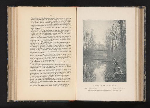 Two boys fishing in a river in the forest of Créteil, France